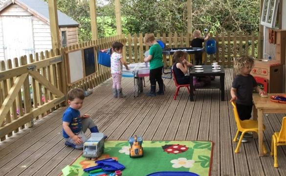 Children playing on new school decking