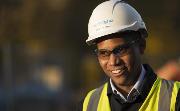National Grid's Rodney Williams wearing hard hat and high vis vest