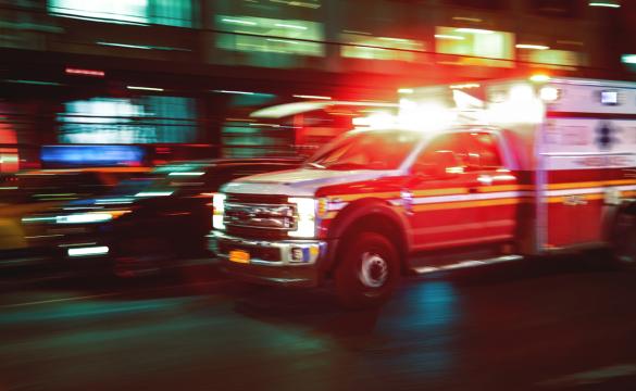 Blurred image of a US ambulance in motion - used for the National Grid story 'Powering healthcare in New York'