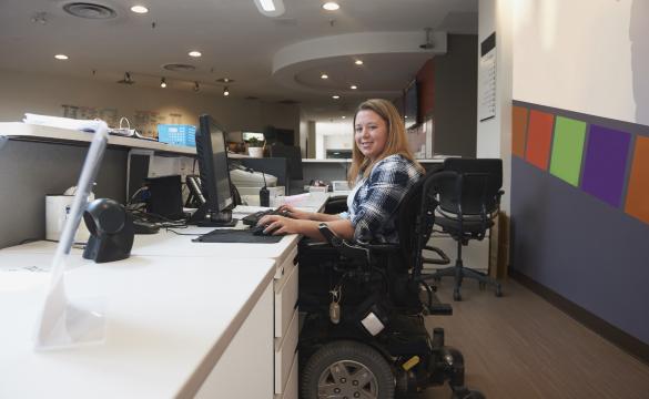 Young woman in wheelchair for National Grid article on disability