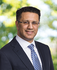 BadarKhan_200x248.png Portrait photo of President of National Grid US Badar Khan for climate change challenge story