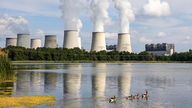 EnergyExplained_CarbonSequestration_640x360.jpg Power station by a lake with geese swimming in the foreground