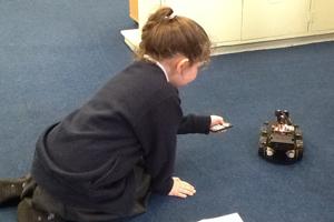 HinkleyEducationFund_YoungGirlPlayingWithRobot_300x200.jpg National Grid Hinkley Education Fund story