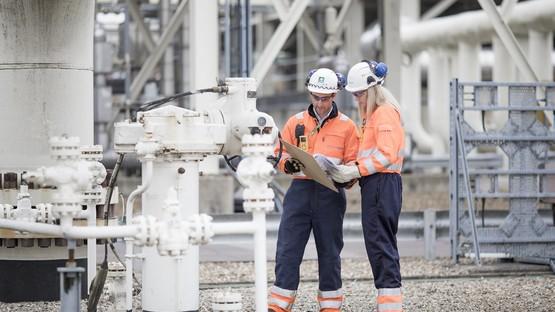 Male and female engineers onsite.jpg Male and female engineers onsite