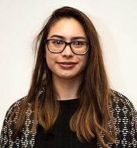 Natasha Bacciarelli_200x217.jpg Young woman engineer with glasses smiling into camera