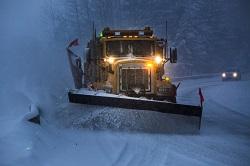 Snowplow in snowy conditions for National Grid article Holiday Heroes_250x166.jpg Snowplow in snowy conditions for National Grid article Holiday Heroes