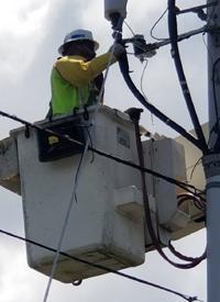 US lineworker Donald Lopes in bucket truck - 200x275.jpg National Grid US lineworker Donald Lopes in bucket truck