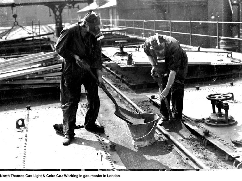 VEDay_WorkingInGasMasksInLondon.jpg Workers wearing gas masks during WW2 in London - used for the National Grid story 'VE Day 2020: The people powering the nation during WW2'